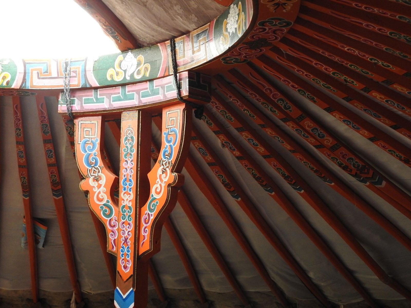 The interior decoration of a traditional ger - including the beautiful orange decorative paintwork