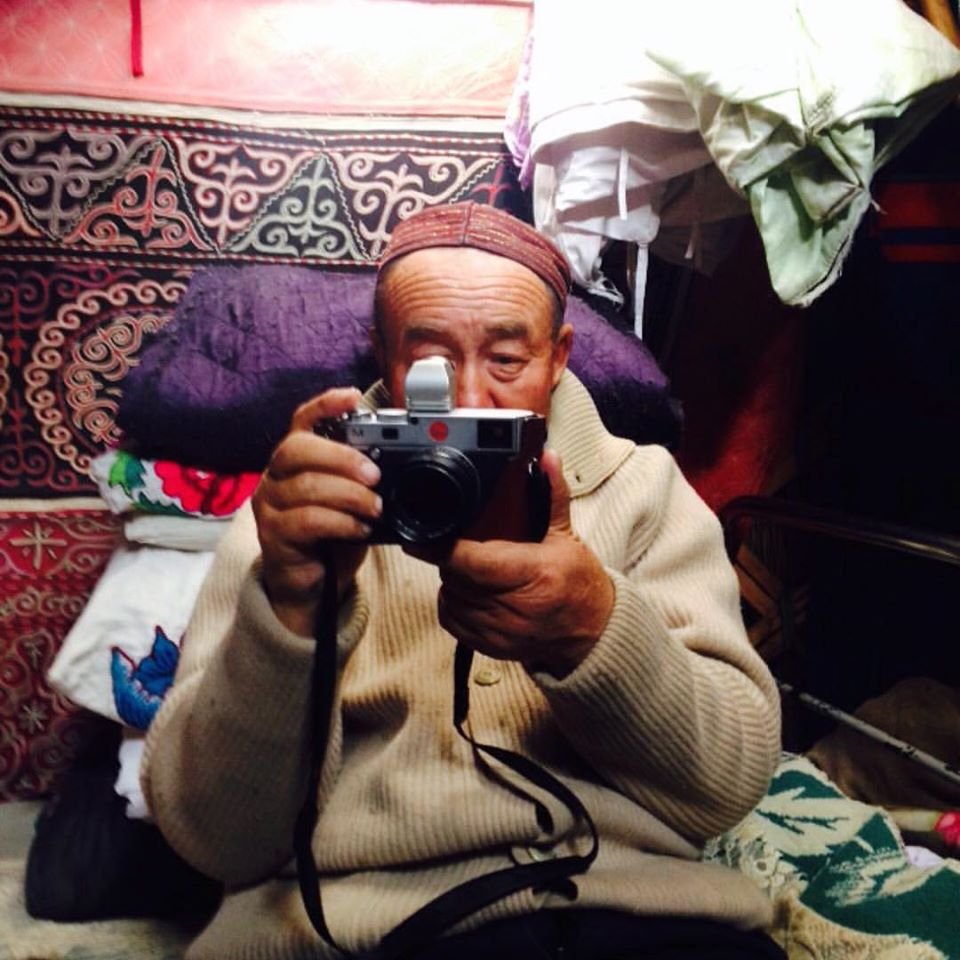 Kazakh with camera in our Responsible Photography in Mongolia article