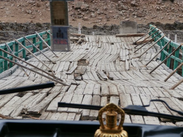 Cross a Mongolian river by bridge