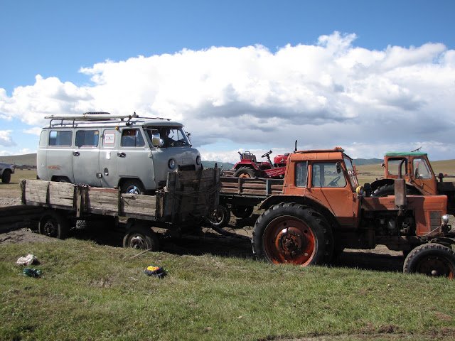 Mongolian river crossing with a tractor