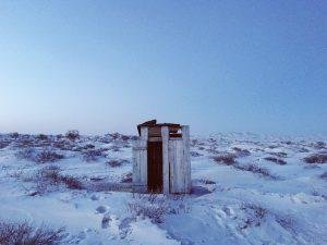 Long drop toilet Mongolia winter