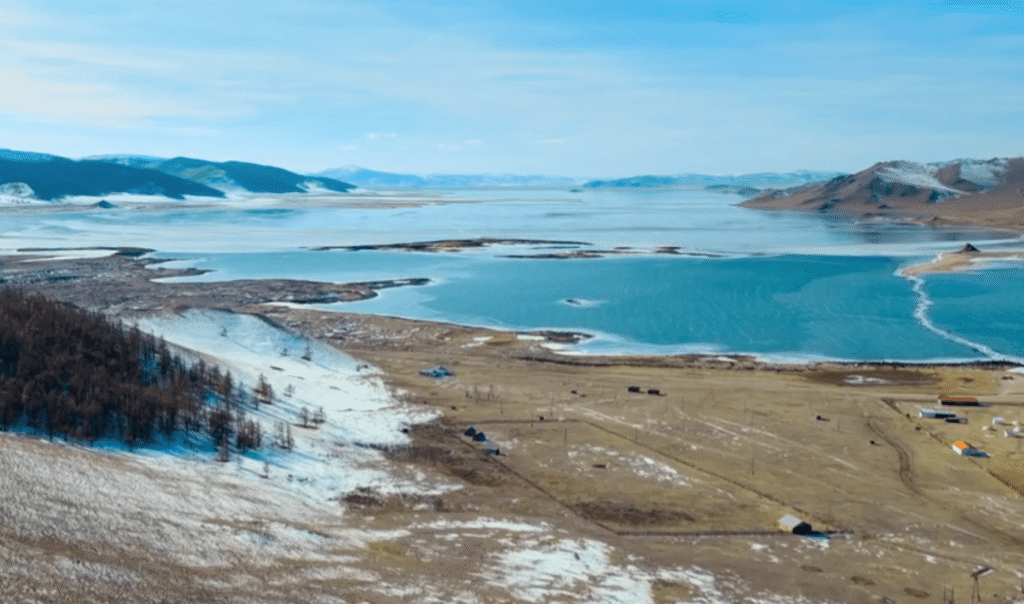 Screenshot from BBC’s Race Across The World Series 6 showing Terkhiin Tsagaan Nuur, also known as White Lake, in Arkhangai Province, central Mongolia.